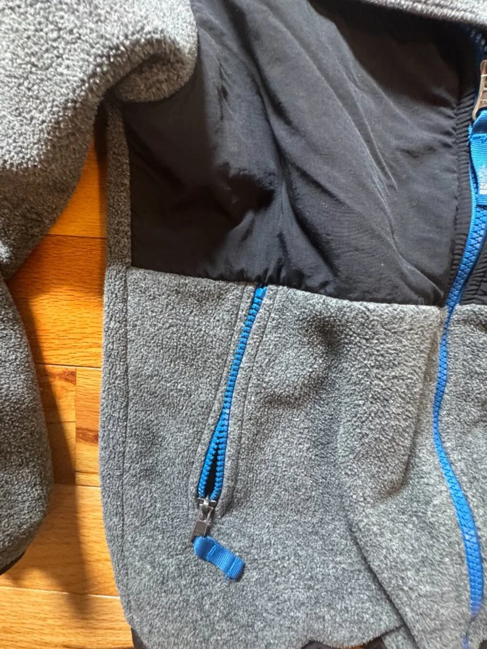 The North Face Black and Gray Jacket with Blue Accents